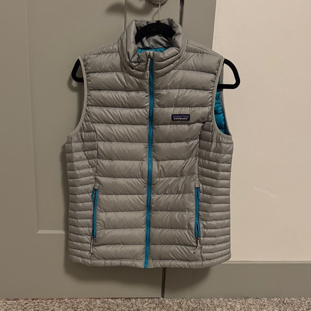 Patagonia Light Gray Puffer Vest with Blue Trim
